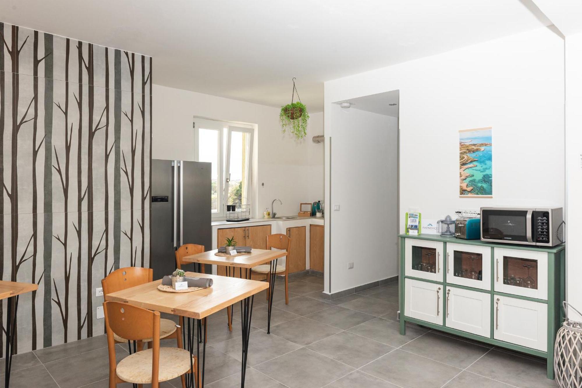 Guest House - Affittacamere Green Apartment - By Faendho Porto Torres Zewnętrze zdjęcie