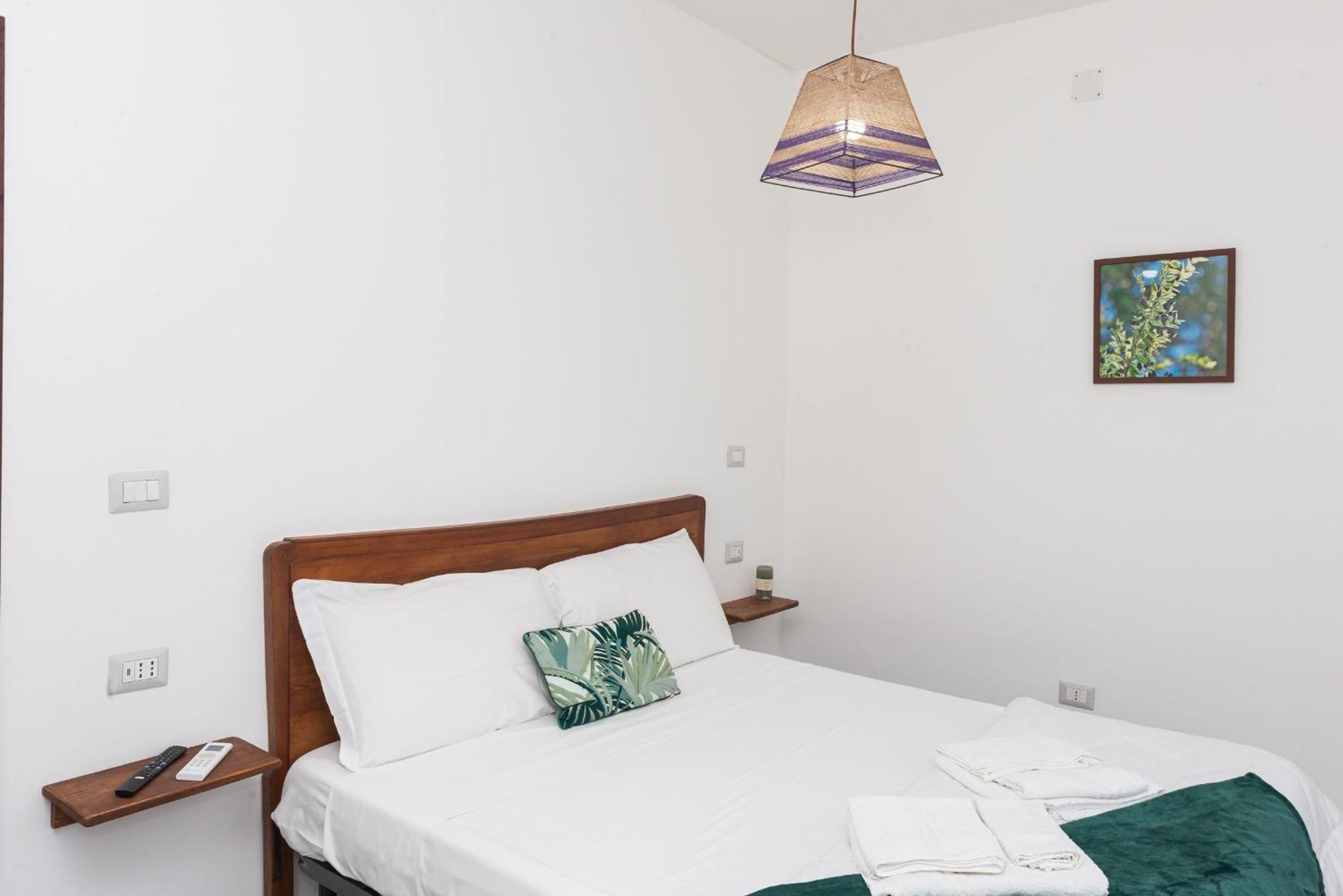 Guest House - Affittacamere Green Apartment - By Faendho Porto Torres Zewnętrze zdjęcie
