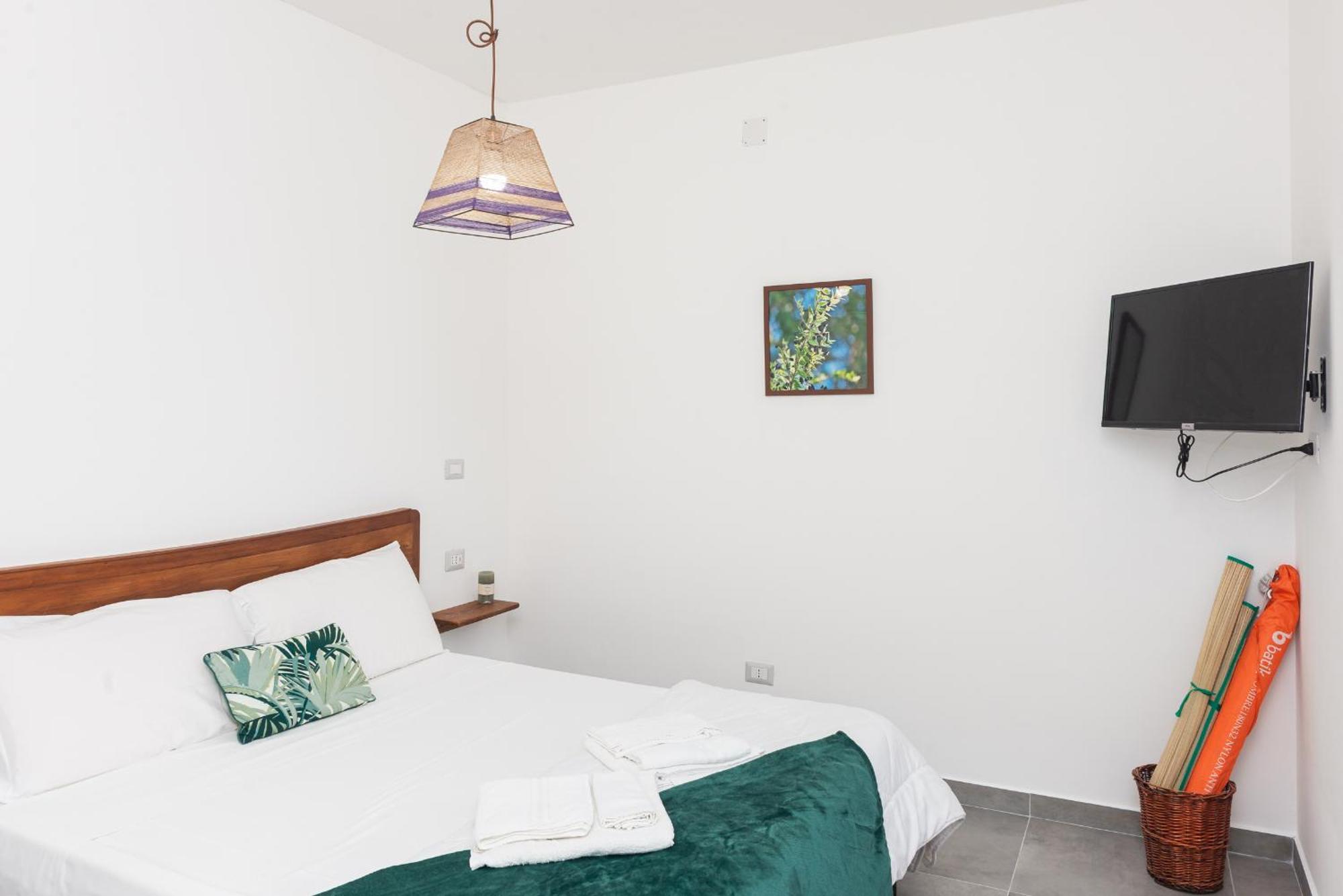 Guest House - Affittacamere Green Apartment - By Faendho Porto Torres Zewnętrze zdjęcie