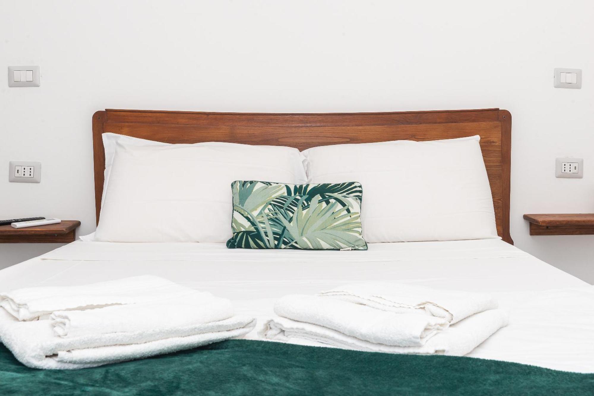 Guest House - Affittacamere Green Apartment - By Faendho Porto Torres Zewnętrze zdjęcie