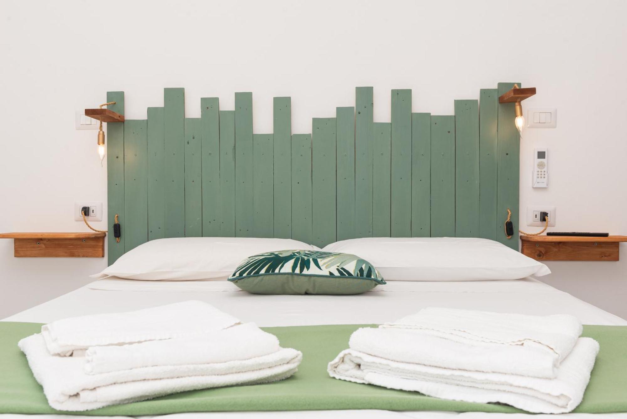 Guest House - Affittacamere Green Apartment - By Faendho Porto Torres Zewnętrze zdjęcie